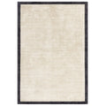 Asiatic Blade Border Putty Charcoal 10 rectangle rug styled in a living room