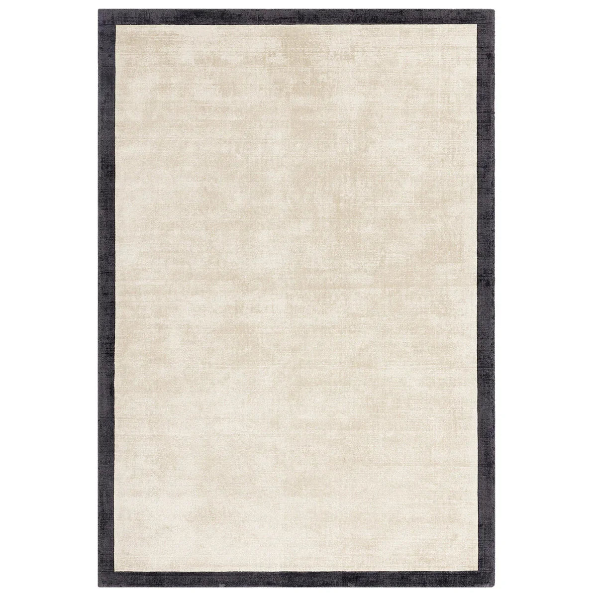 Asiatic Blade Border Putty Charcoal 10 rectangle rug styled in a living room