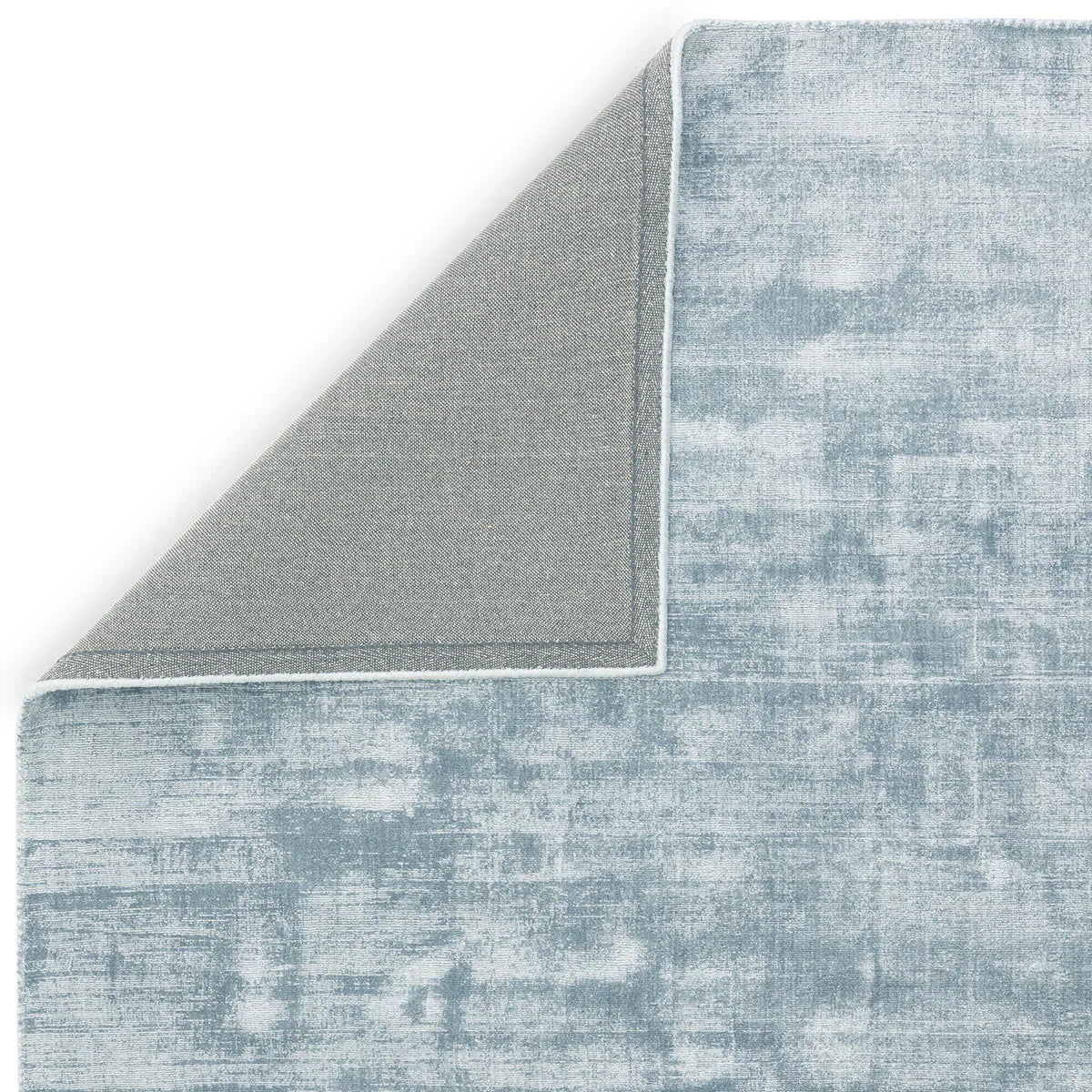 Asiatic Blade Airforce Blue Runner Rug distressed abstract pattern in airforce blue and grey on white, machine-made.