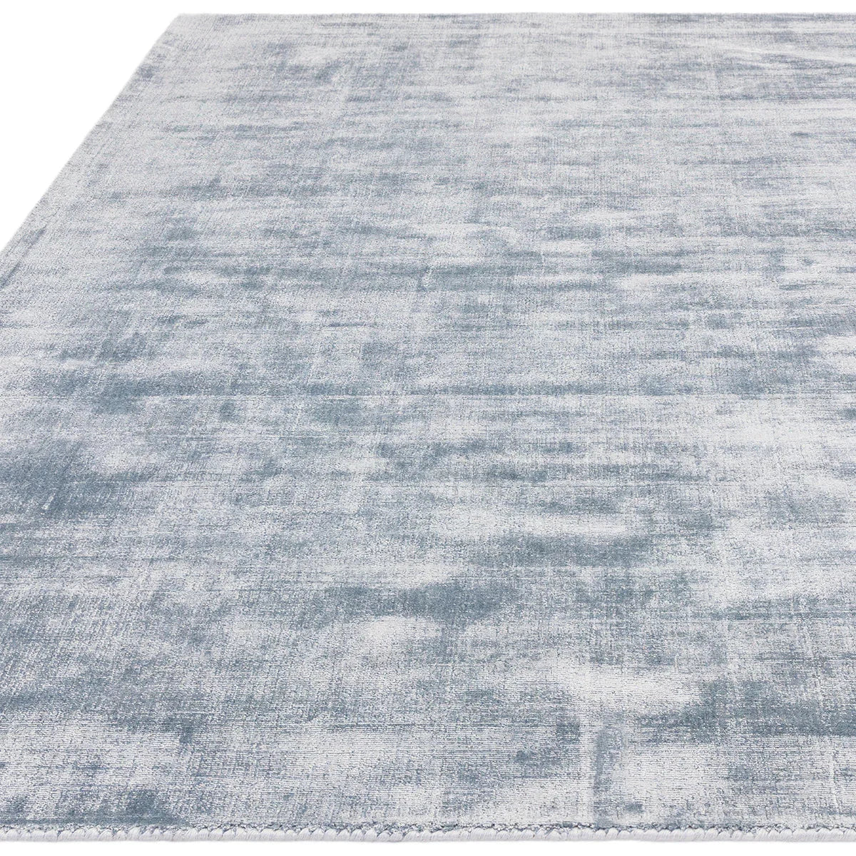 Asiatic Blade Airforce Blue Designer Rug featuring mottled pattern in Airforce Blue on white, woven polyester