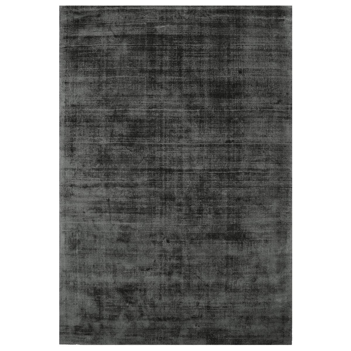 Asiatic Blade Charcoal rectangle rug styled in a living room