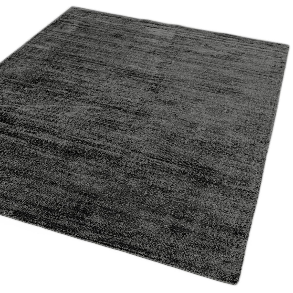 Asiatic Blade Charcoal Designer Rug featuring charcoal, dark grey and light grey on white background, hand-tufted wool