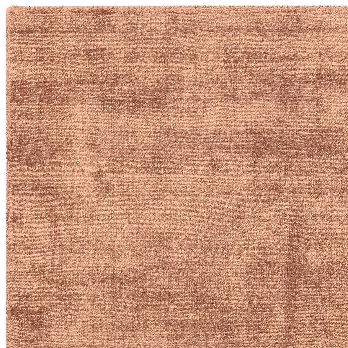 Asiatic Blade Earth Designer Rug featuring copper tones in copper, rust and bronze on white background, machine-made wool