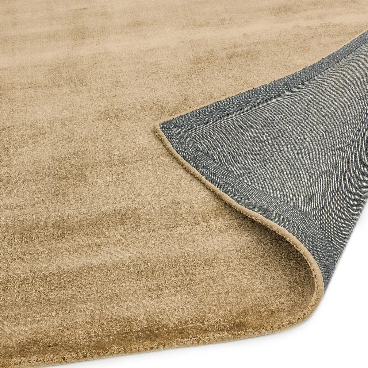 Asiatic Blade Soft Gold Designer Rug with distressed gold field denim-blue reverse on beige background, hand-made wool