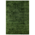 Asiatic Blade Green rectangle rug styled in a living room