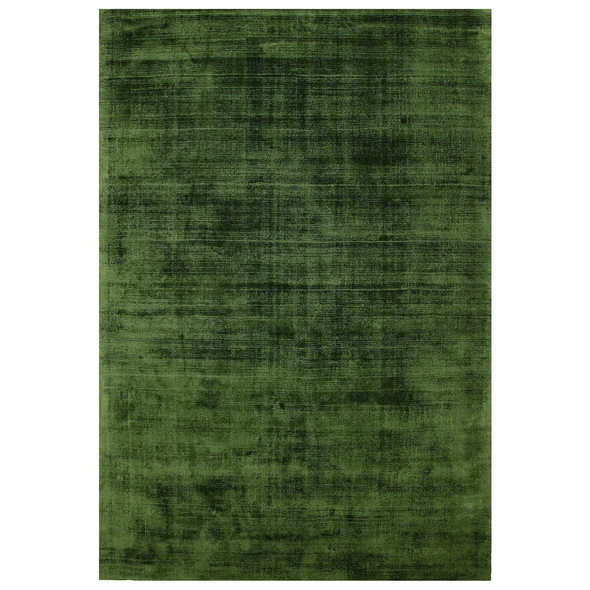 Asiatic Blade Green rectangle rug styled in a living room