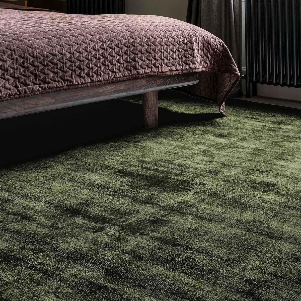 Asiatic Blade Green Designer Rug: textured olive, emerald and moss greens on forest green ground; hand-tufted wool
