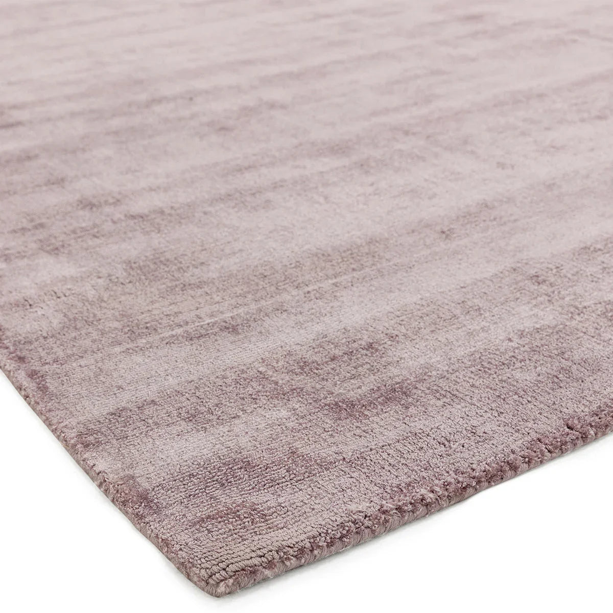 Asiatic Blade Heather Runner Rug featuring heather in dusty pink, mauve and rose on white background, machine-made wool