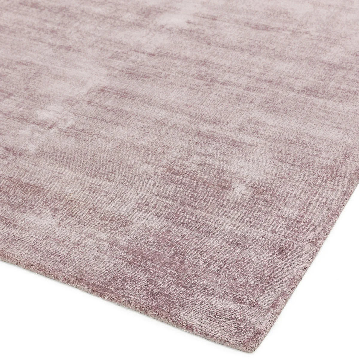Asiatic Blade Heather Rug featuring distressed pattern in dusty rose, mauve and blush on white background, tufted wool