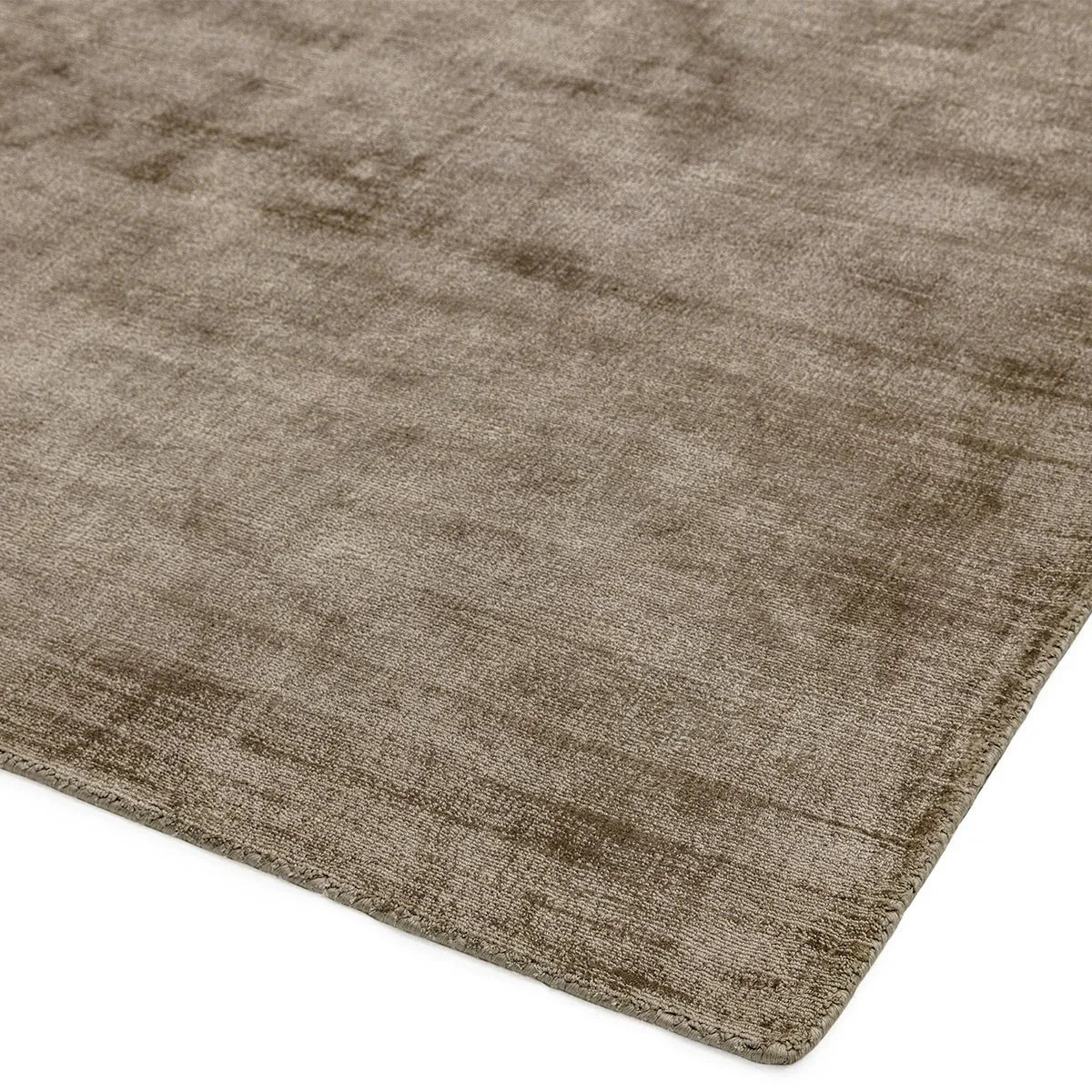 Asiatic Blade Mocha Designer Rug featuring textured solid pattern in mocha brown on white background, machine-made wool