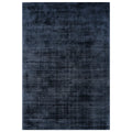 Asiatic Blade Navy rectangle rug styled in a living room