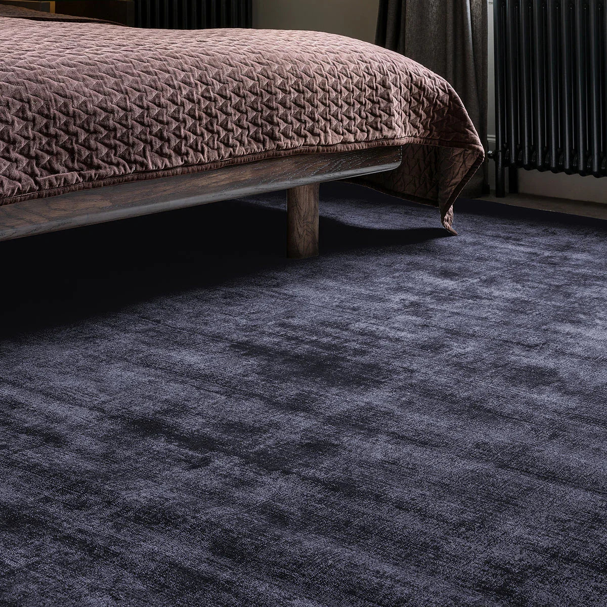 Asiatic Blade Navy Designer Rug with textured solid pattern in navy, indigo and charcoal on navy background, loomed wool