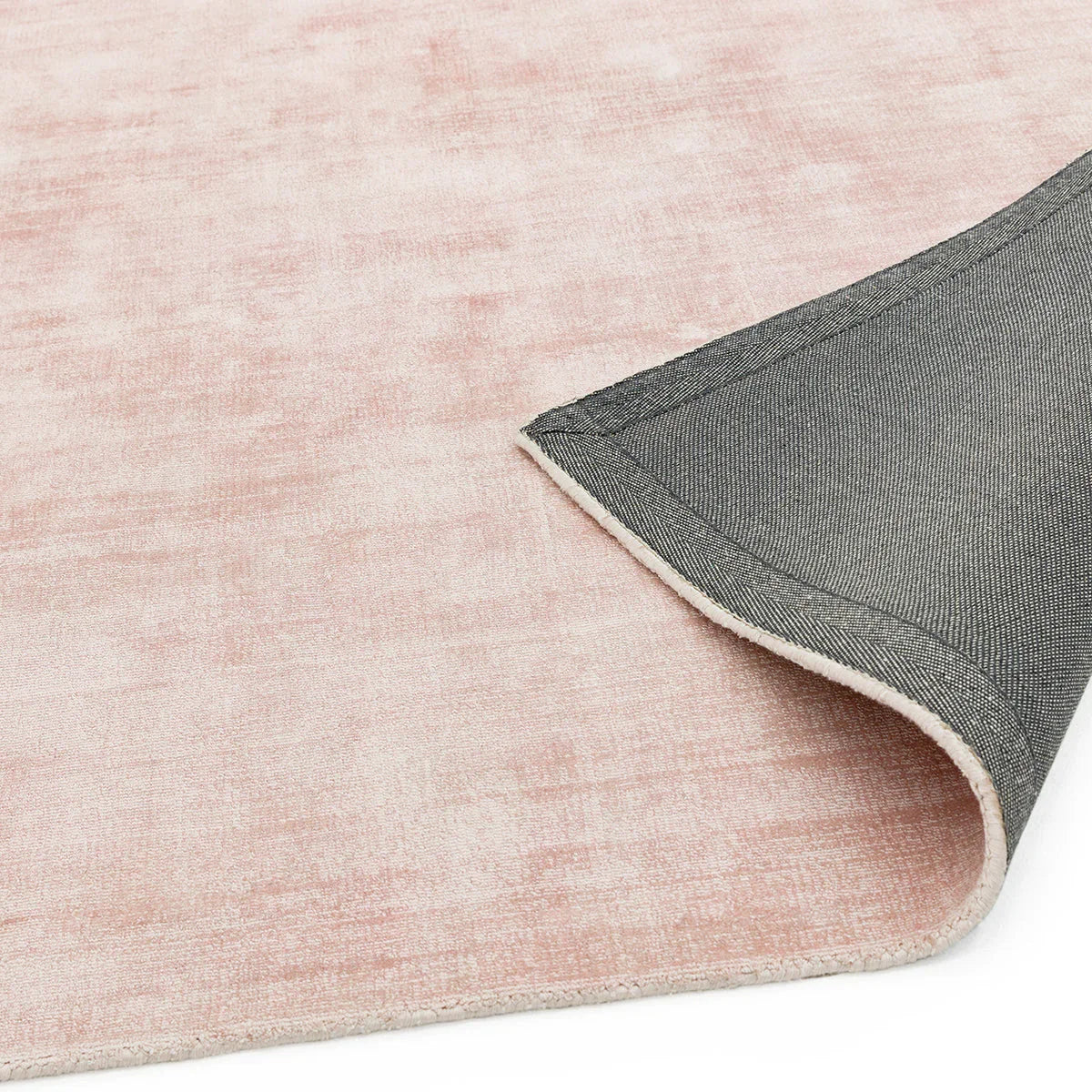 Asiatic Blade Pink Runner Rug featuring solid blush pink pile with grey underside on white background, machine-woven polyester
