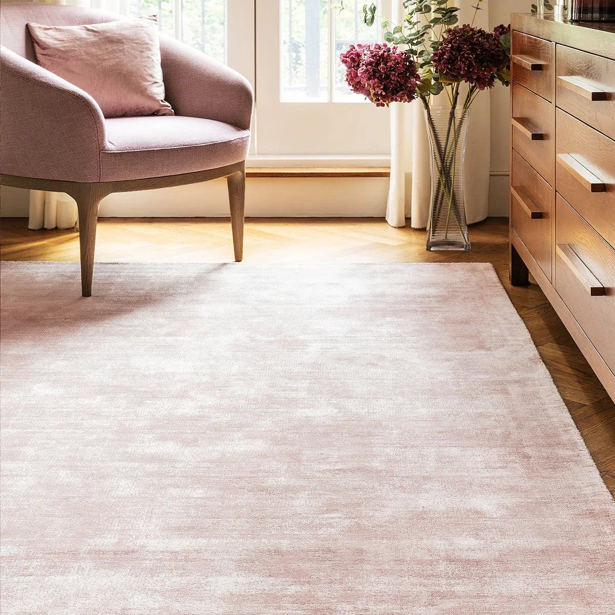 Asiatic Blade Pink Designer Rug featuring solid pink texture in blush-rose on cream background machine-made polyester