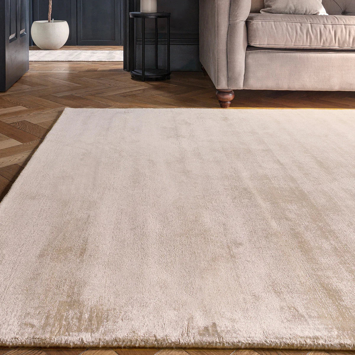 Asiatic Blade Putty Designer Rug featuring tonal texture in putty beige and cream on ivory background, hand-tufted wool