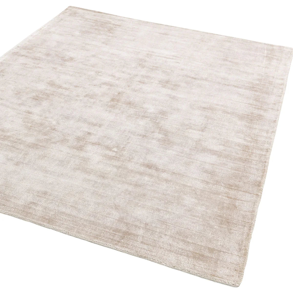 Asiatic Blade Putty Designer Rug featuring textured solid in putty, cream and ivory on white background, hand-tufted wool