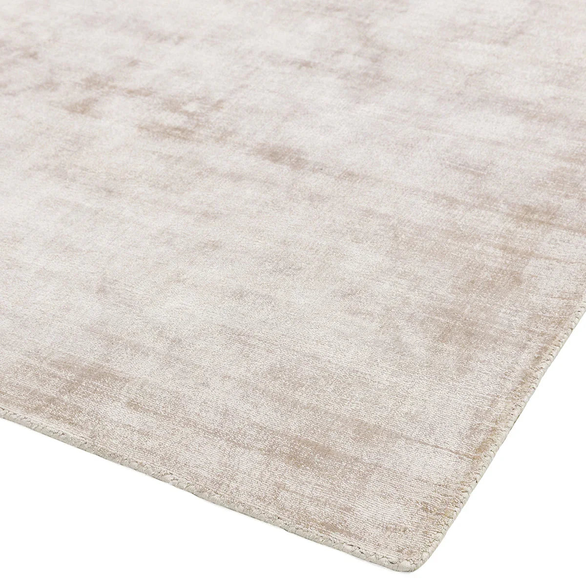 Asiatic Blade Putty Rug featuring textured putty pattern in beige and cream on white background loom-woven wool