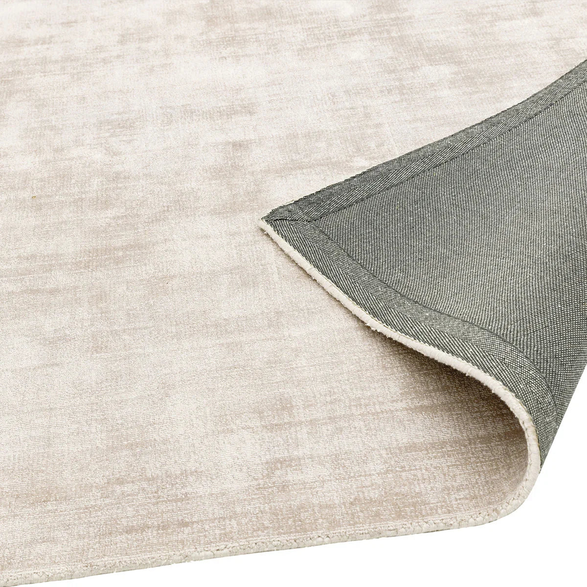 Asiatic Blade Putty Designer Rug featuring textured field in cream/putty, beige and grey on white, machine-made wool