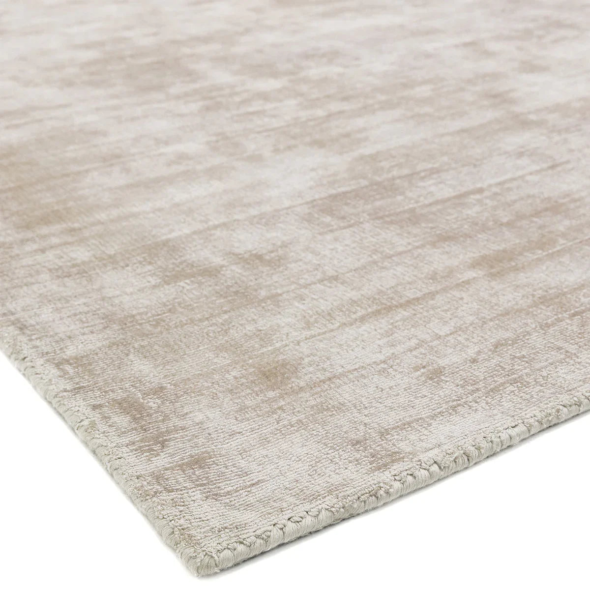 Asiatic Blade Putty Designer Rug featuring textured pattern in putty, beige and cream on white, machine-made wool