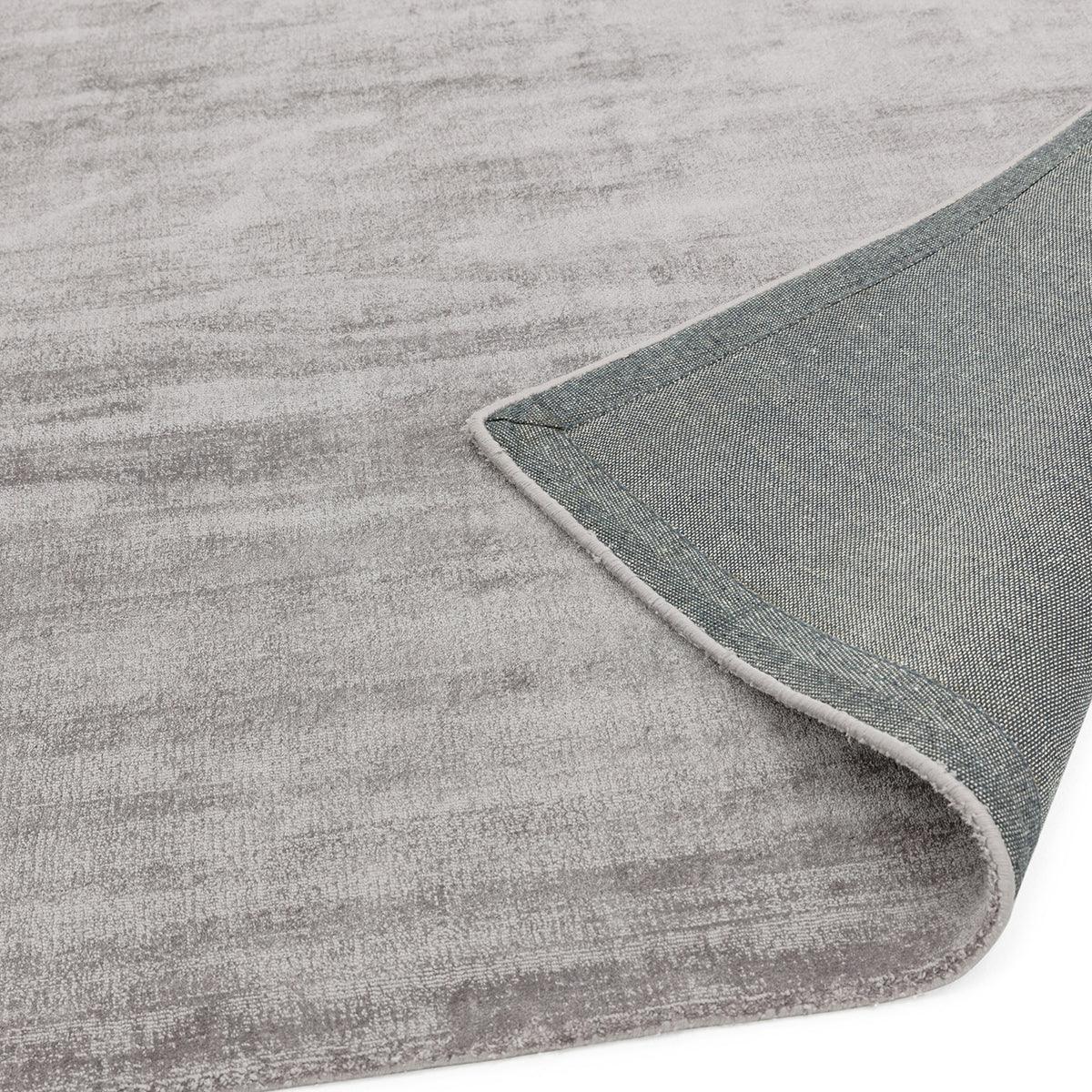 Asiatic Blade Silver Designer Rug featuring distressed pattern in silvery grey and taupe on white, machine-made polyester