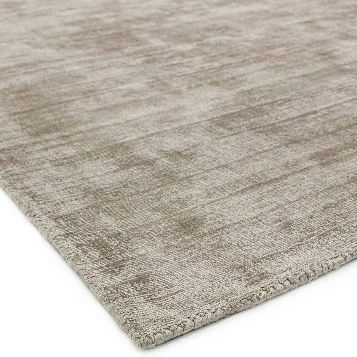 Asiatic Blade Smoke Designer Rug with textured pattern in taupe, beige and cream on white background, machine-woven wool