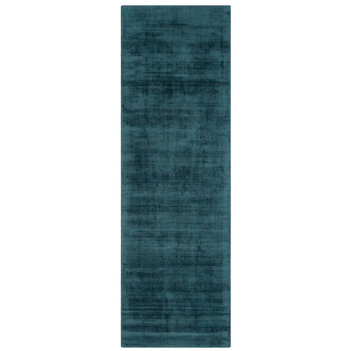Asiatic Blade Teal runner rug styled in a living room