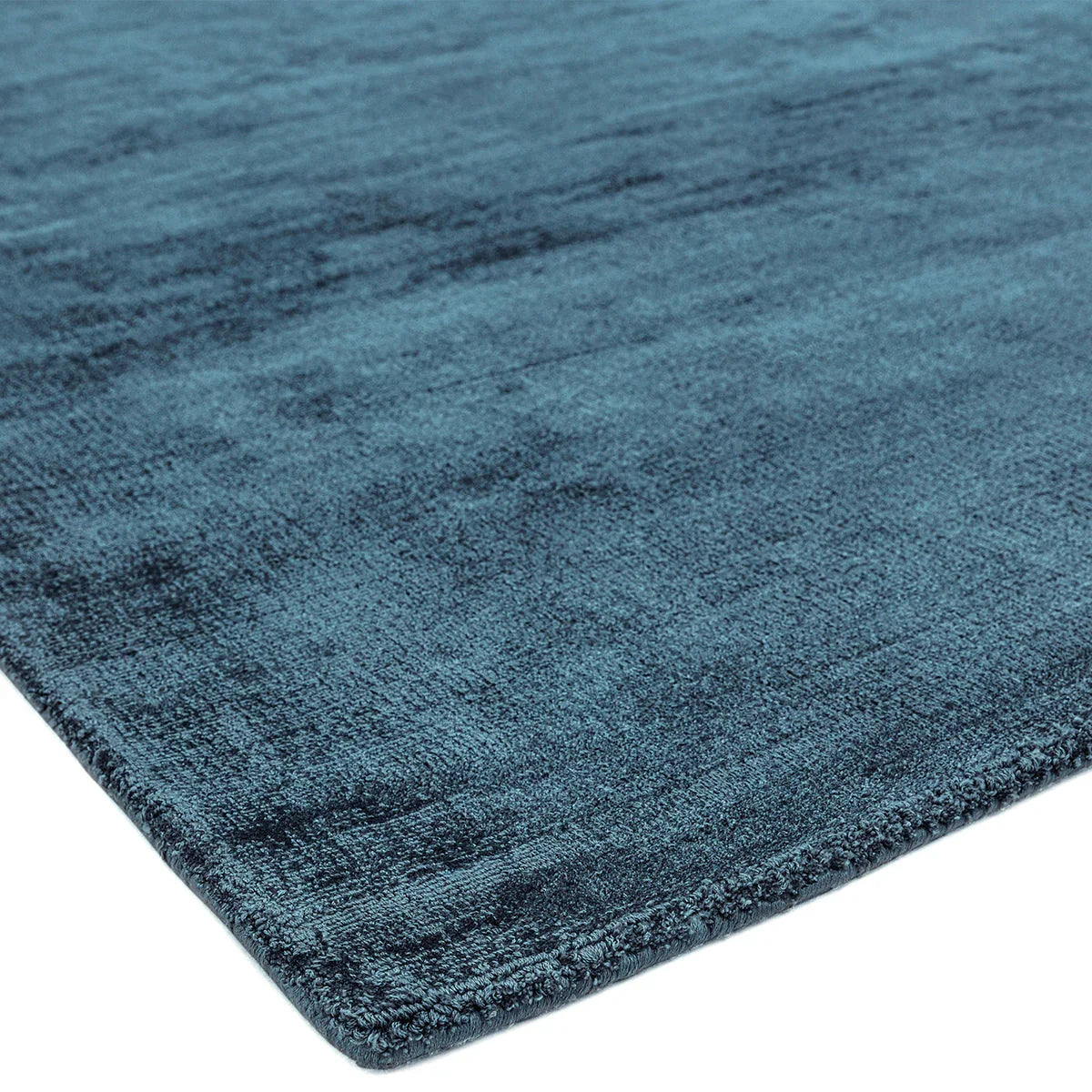 Asiatic Blade Teal Runner featuring textured solid teal pattern on white background, hand-tufted wool
