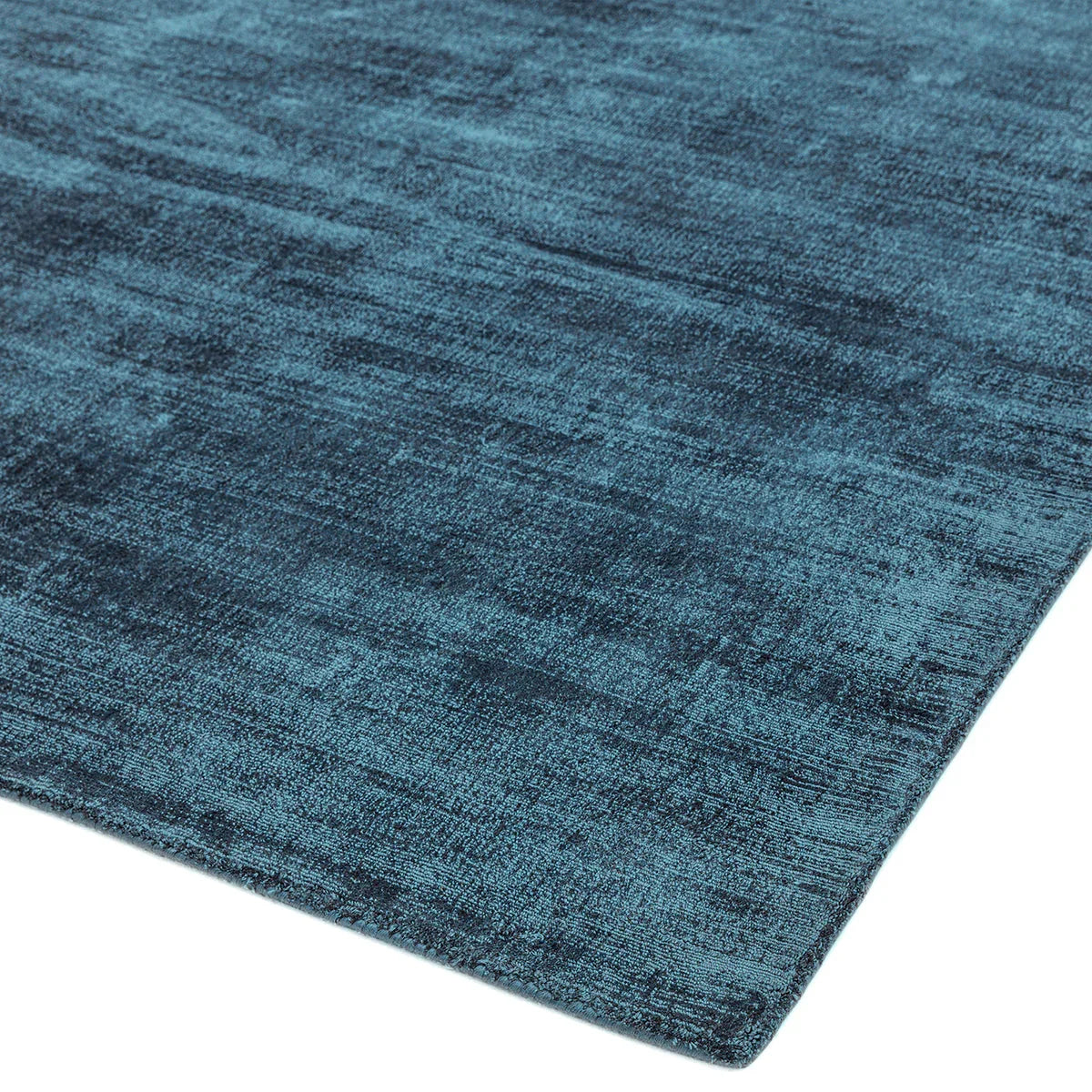 Asiatic Blade Teal Designer Rug featuring textured pattern in teal, deep teal and navy on white, hand-tufted wool