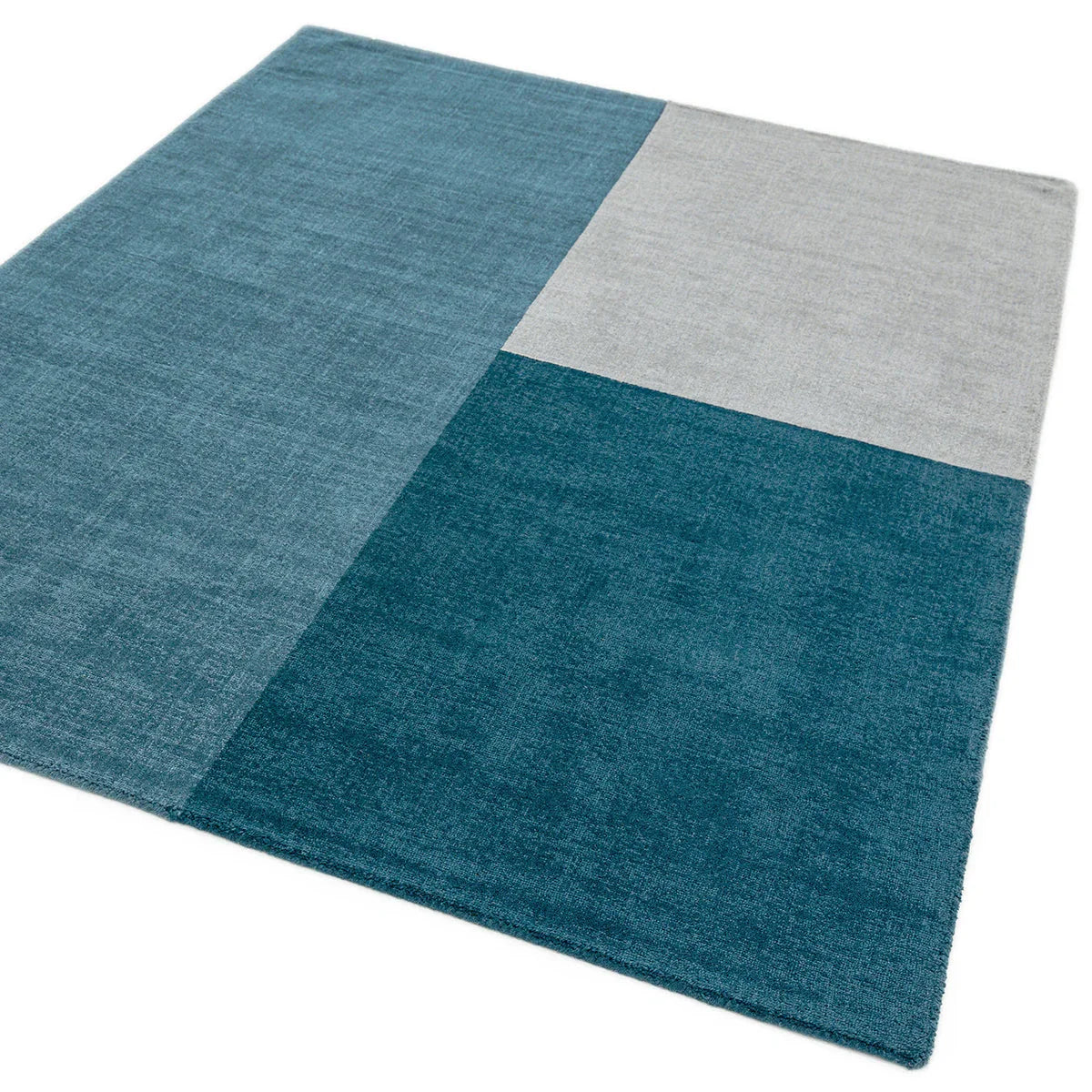Asiatic Blox Teal Designer Rug featuring geometric patchwork in teal, turquoise and light grey on white, woven wool