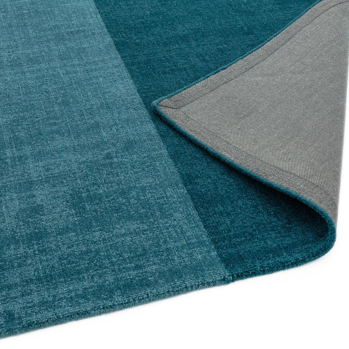 Asiatic Blox Teal Rug featuring block colour panels in teal and dark teal on light grey backing, hand-tufted wool