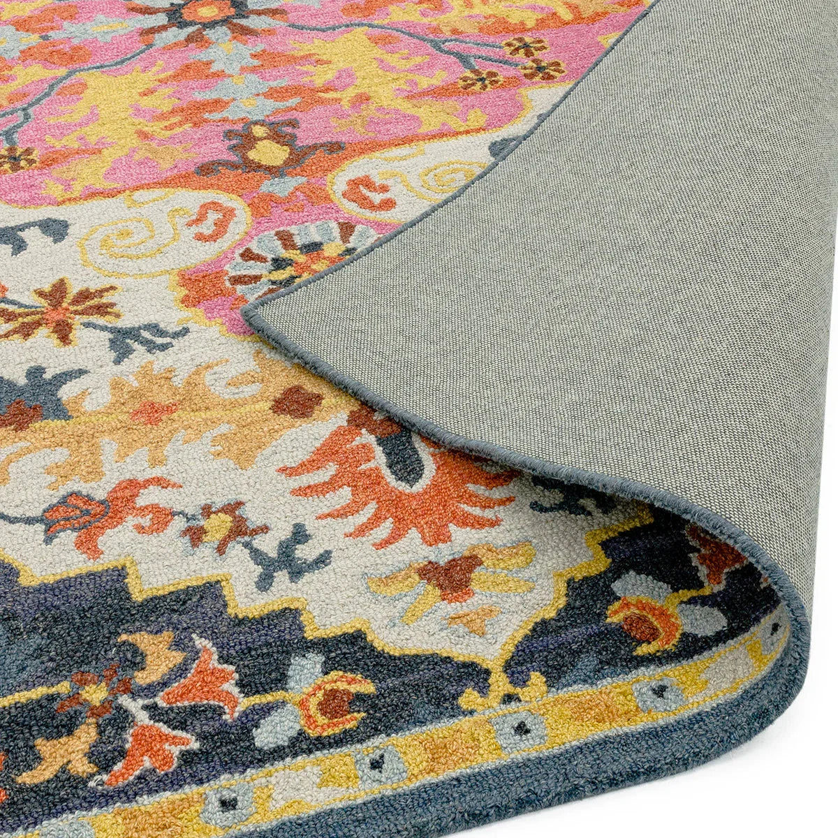 Asiatic Bronte Multi Designer Rug featuring floral pattern in pink, yellow and navy on cream background, tufted wool