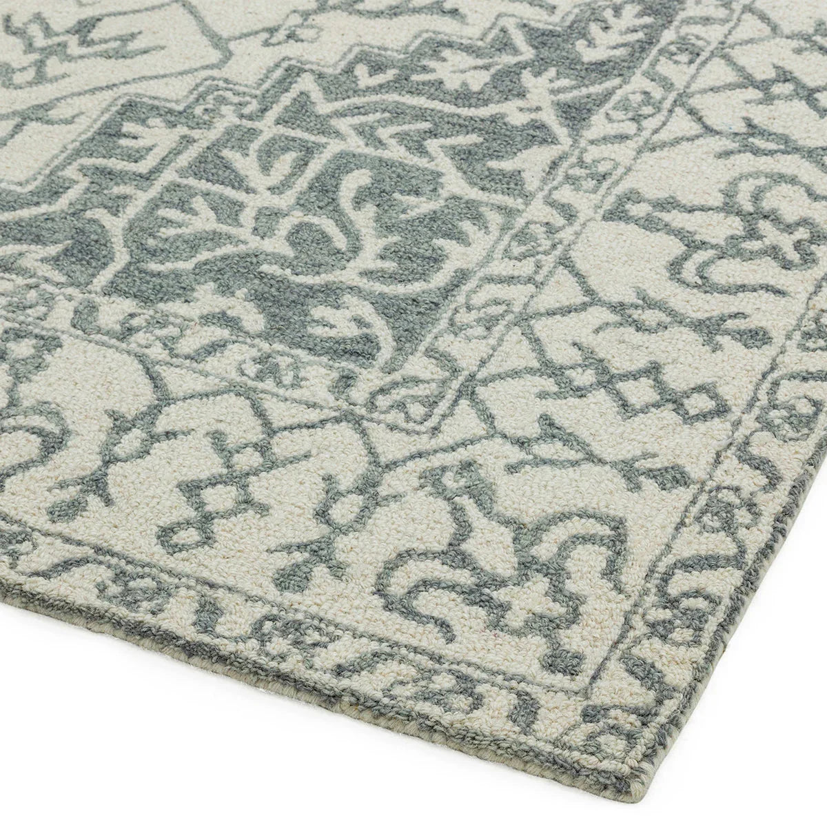 Asiatic Bronte Silver Rug featuring floral pattern in cream and blue-grey on ivory background, machine-made wool