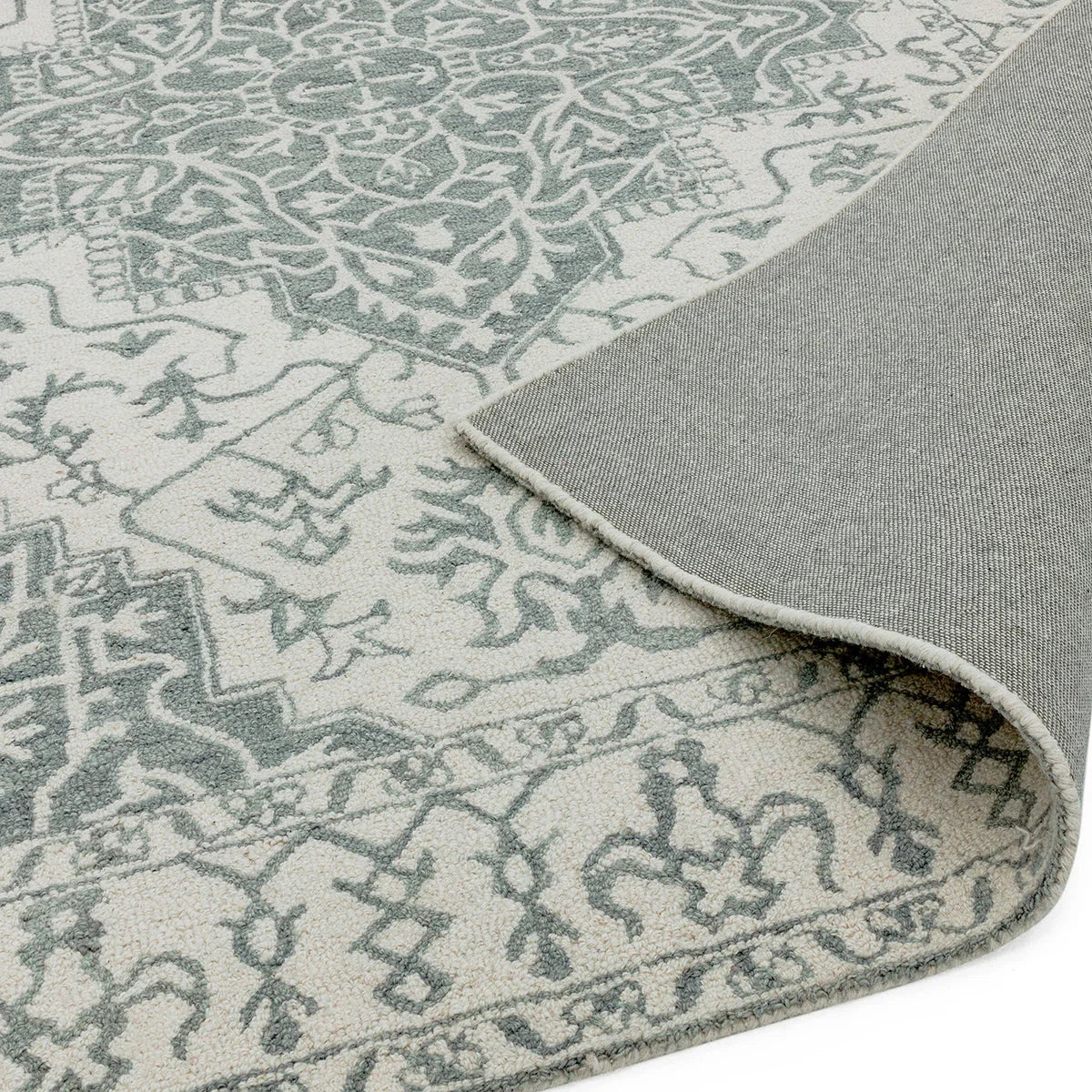 Asiatic Bronte Silver Designer Rug featuring teal, blue-grey and ivory arabesque on ivory background, hand-tufted wool
