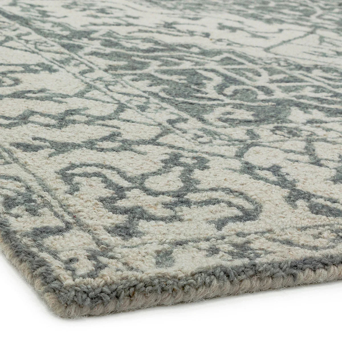 Asiatic Bronte Silver Designer Rug featuring arabesque in slate blue-grey, cream and silver on cream, power-loomed wool