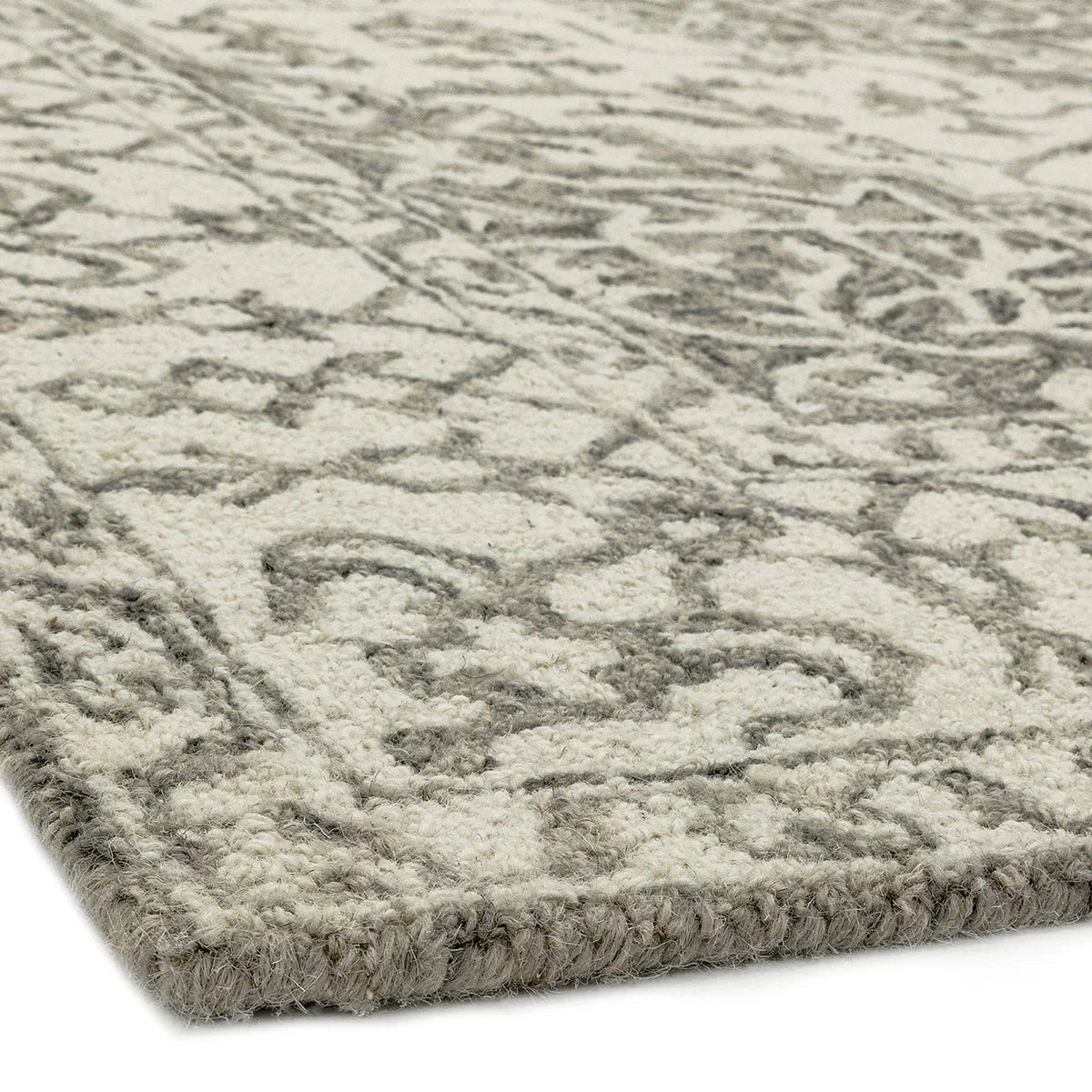 Asiatic Bronte Smoke Designer Rug featuring damask pattern in ivory and smoky grey on ivory, hand-tufted wool