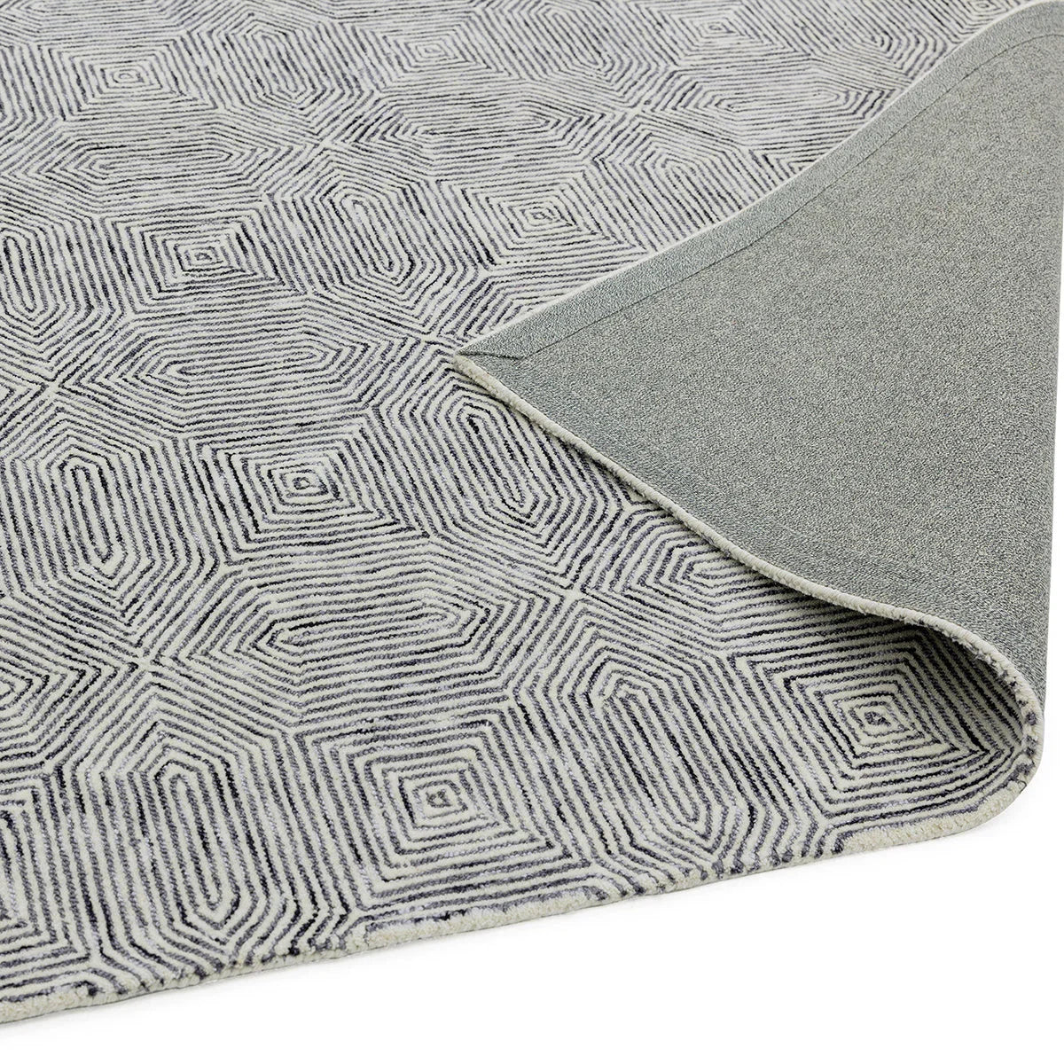 Asiatic Camden Black/White Rug featuring geometric square-spiral in navy, black on cream background, machine-made wool