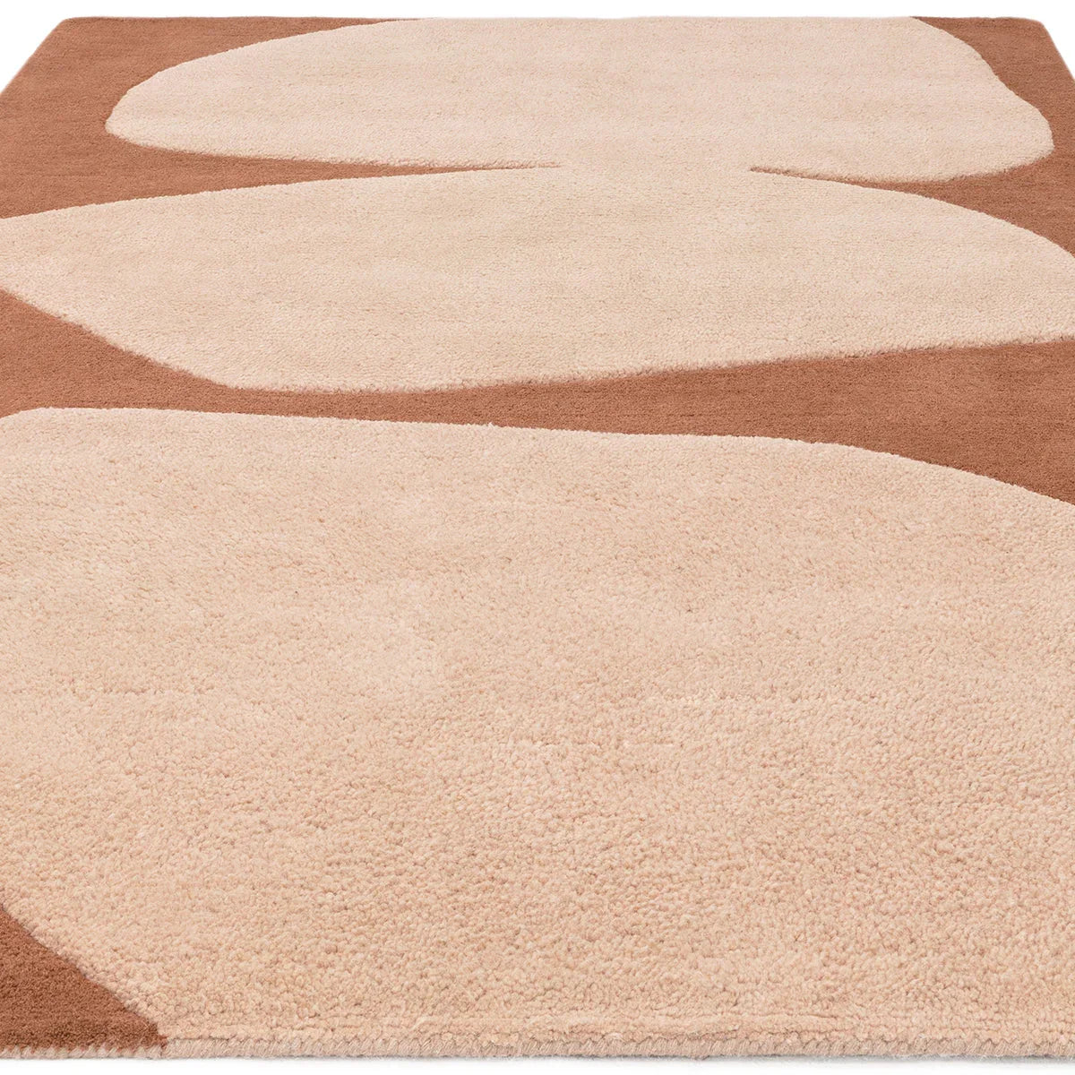 Asiatic Canvas 05 Collage Designer Rug featuring abstract collage in soft peach, cream and brown on brown background, machine-woven wool