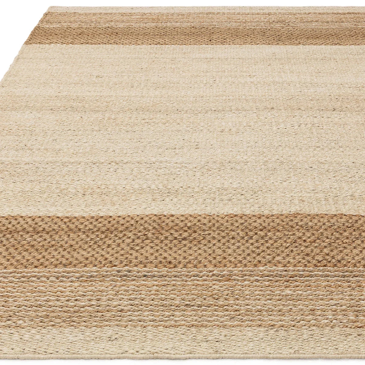 Asiatic Cedar Bleach Natural Designer Rug featuring striped bands in cream, beige, tan and brown on white handwoven jute