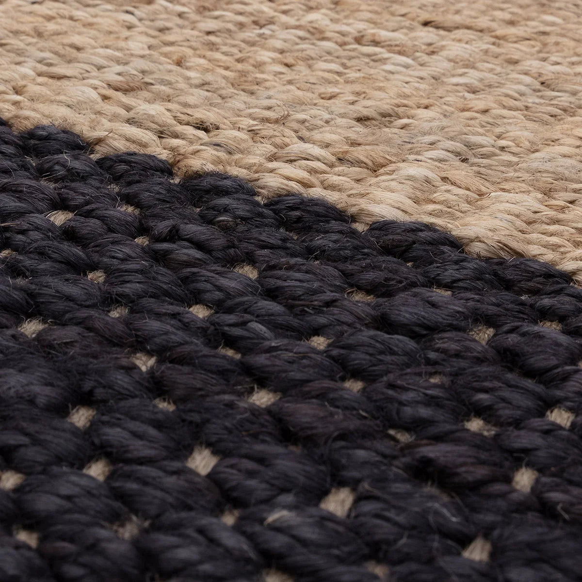 Asiatic Cedar Charcoal Rug featuring chunky woven stripes in charcoal and beige on natural background, hand-tufted wool