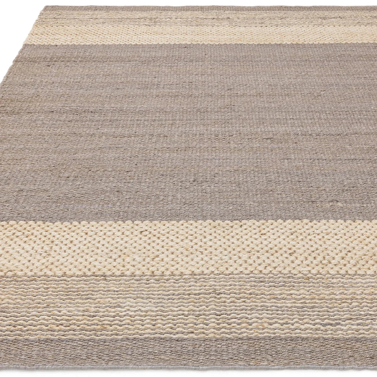 Asiatic Cedar Grey Rug featuring striped bands in slate grey, taupe and cream on white background, handwoven wool