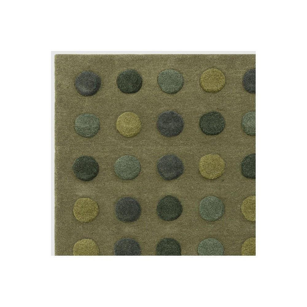 Asiatic Dotty Green Designer Rug with polka-dot pattern in olive, sage, teal and mustard on brown background by Asiatic London