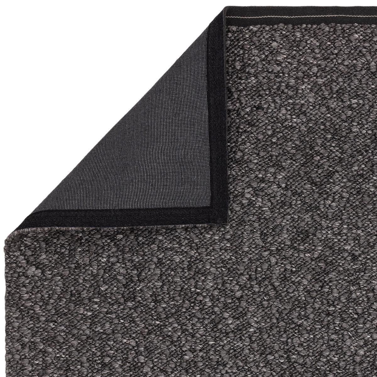 Asiatic Elm Charcoal Designer Rug featuring textured speckled pattern in charcoal, dark grey and light grey on charcoal background, machine-made polypropylene