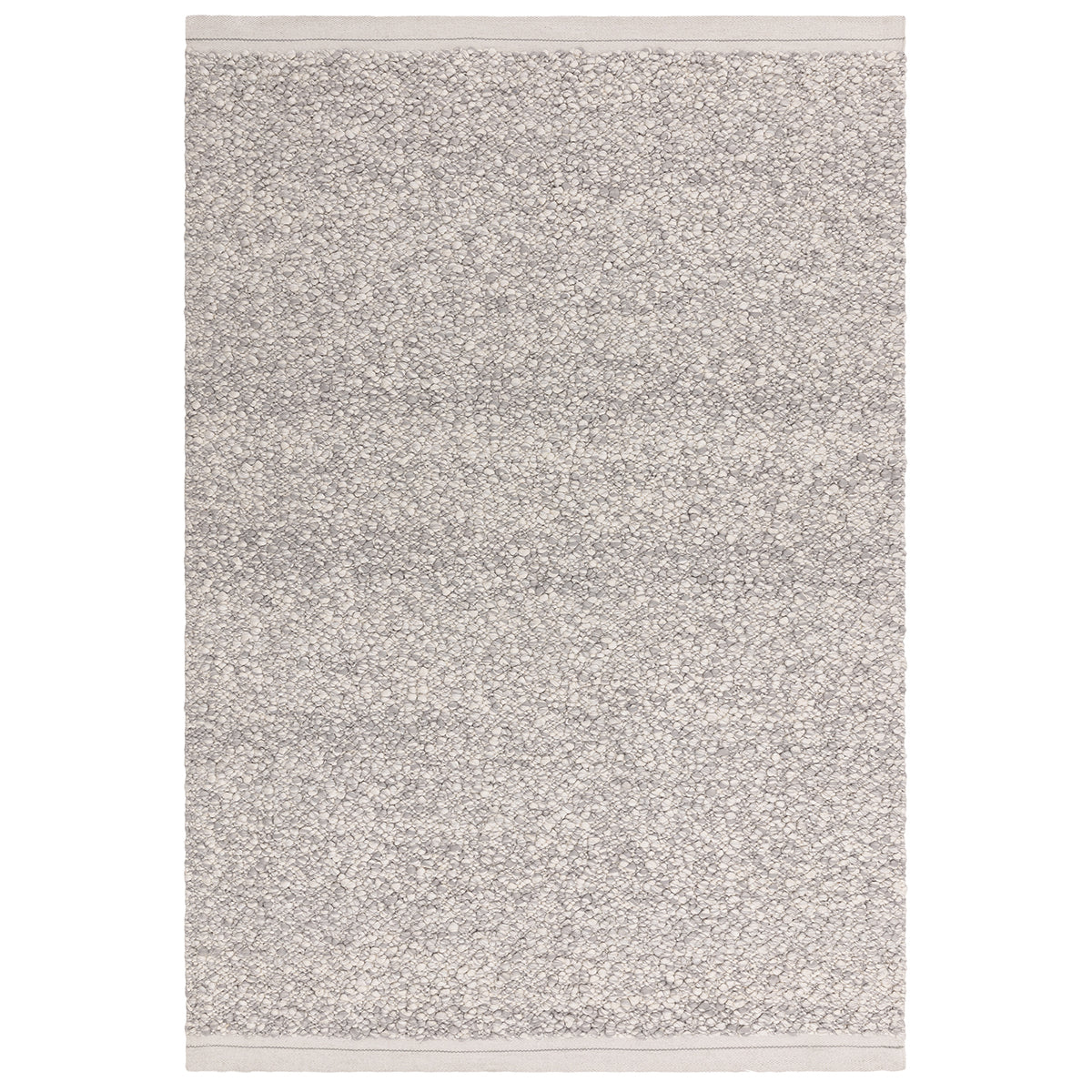 Textured gray area rug on a white background