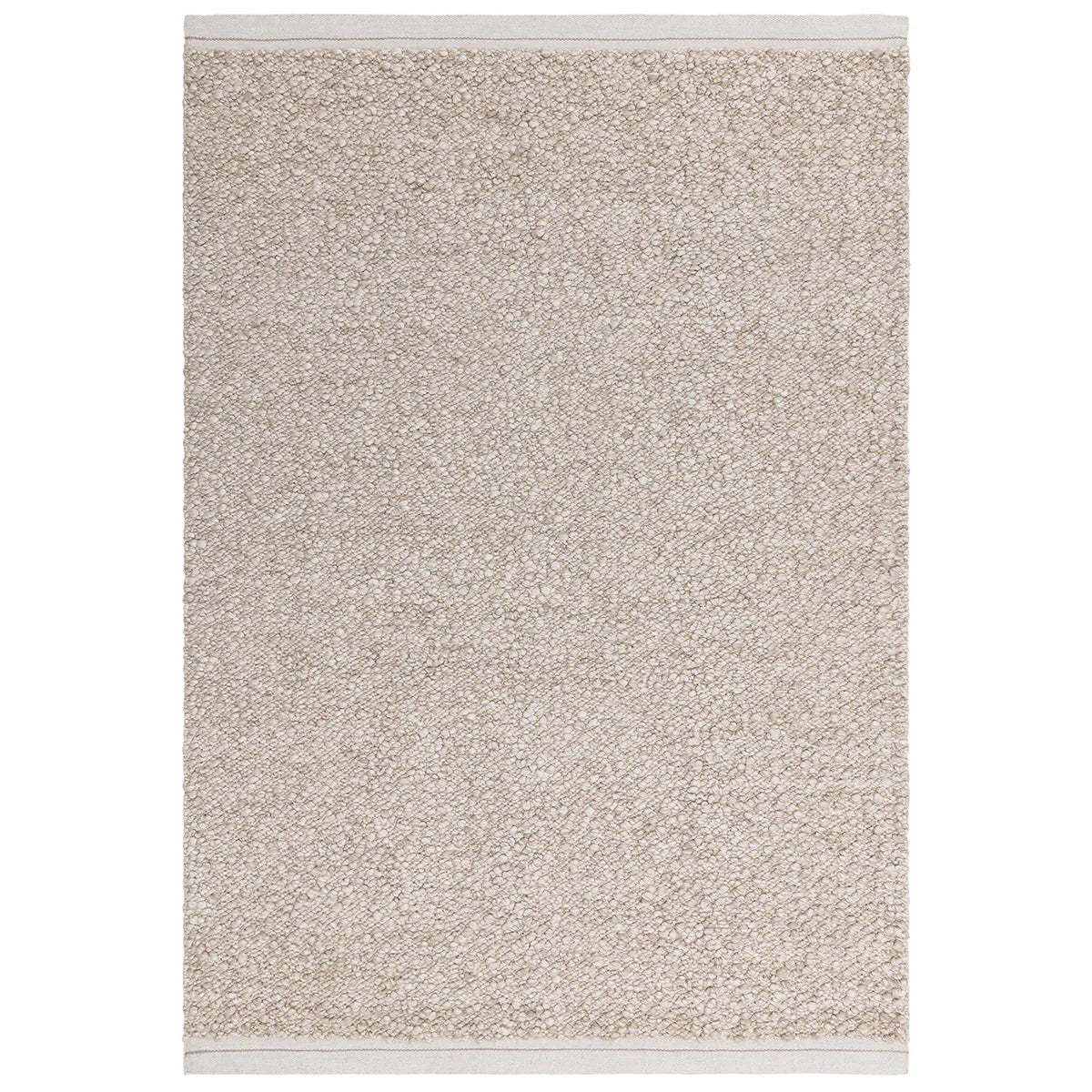 Beige textured rug on a white background
