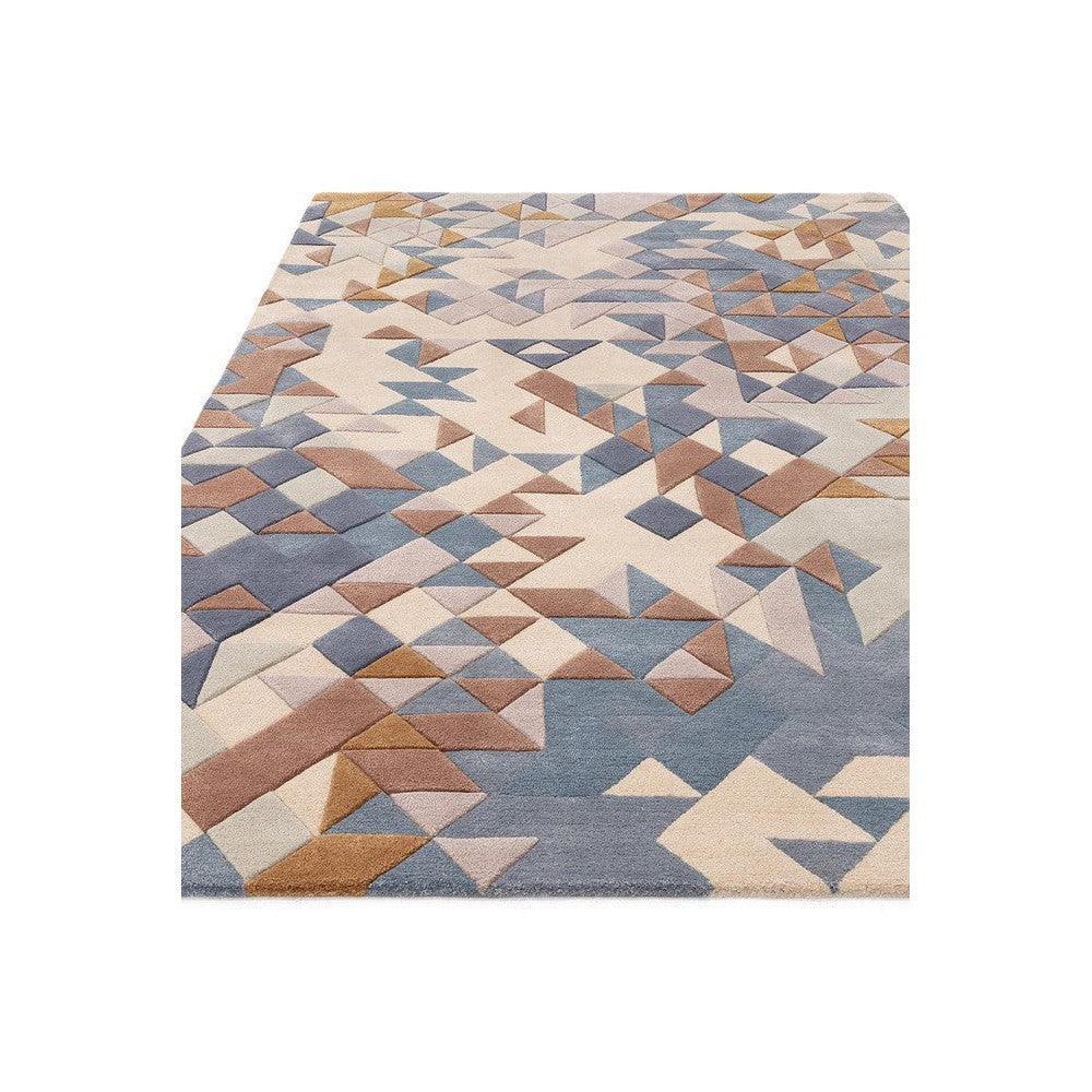 Asiatic Enigma Blue Designer Rug featuring geometric triangle pattern in navy blue, powder blue, cream, taupe on pale beige background, hand-tufted wool