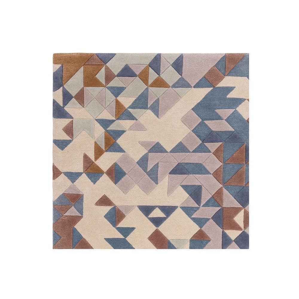 Asiatic Enigma Blue Designer Rug featuring geometric triangular pattern in navy blue, sky blue, beige, taupe and brown on cream background, hand-tufted wool