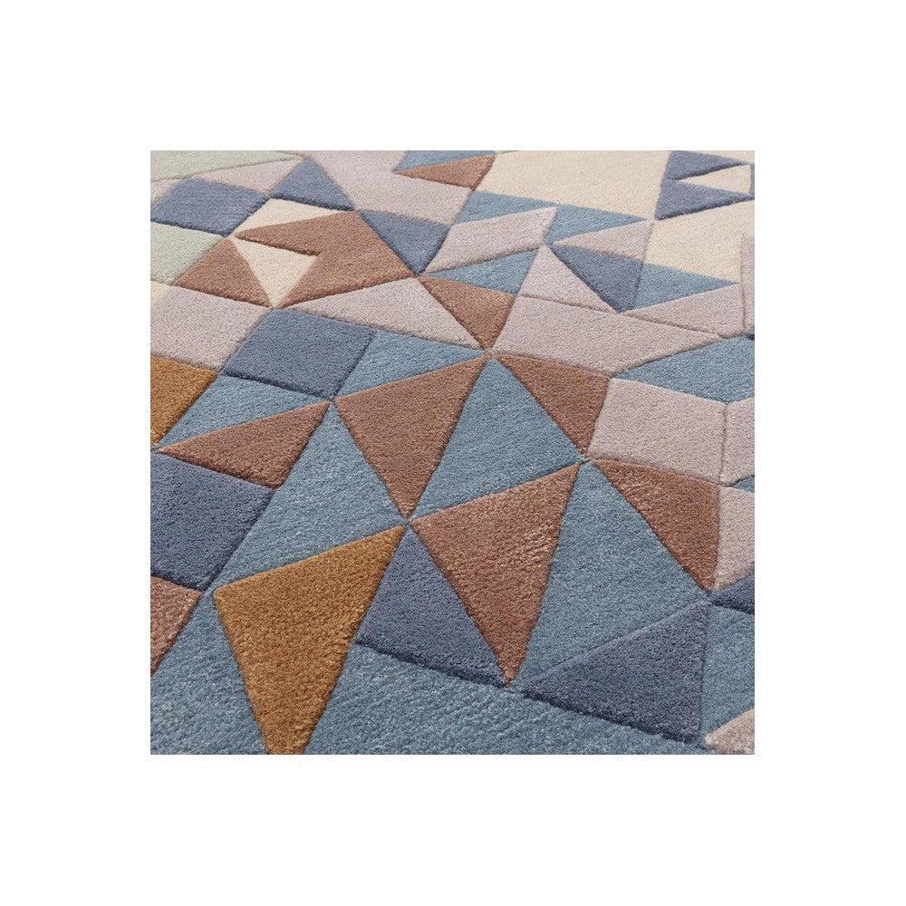 Asiatic Enigma Blue Designer Rug featuring geometric triangles in powder blue, peach and cream on beige background, hand-tufted wool