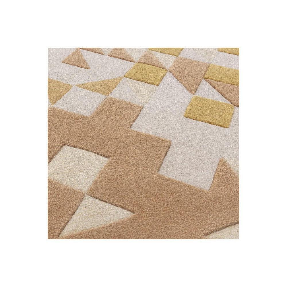 Asiatic Enigma Gold Designer Rug featuring geometric patchwork squares and triangles in gold, beige and cream on ivory background, hand-tufted wool