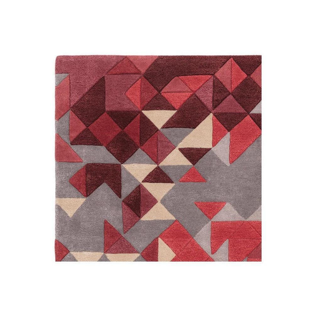 Asiatic Enigma Red Designer Rug featuring geometric triangle pattern in red, burgundy, cream on grey background, hand-tufted wool