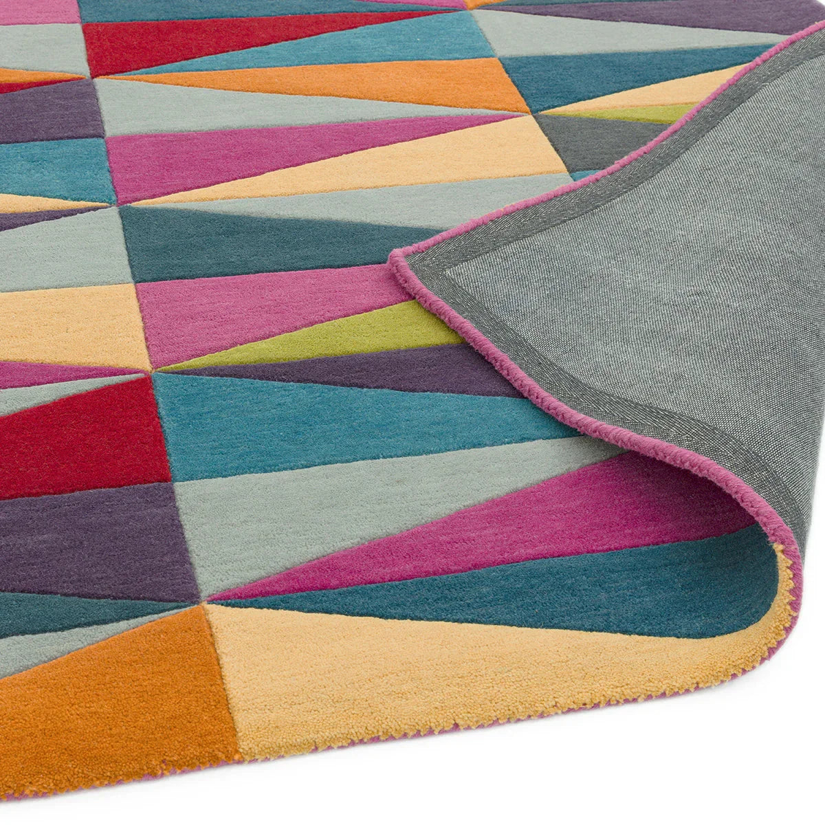 Asiatic Funk Triangles Designer Rug featuring geometric triangle pattern in pink, teal, orange, purple on light grey background, hand-tufted wool